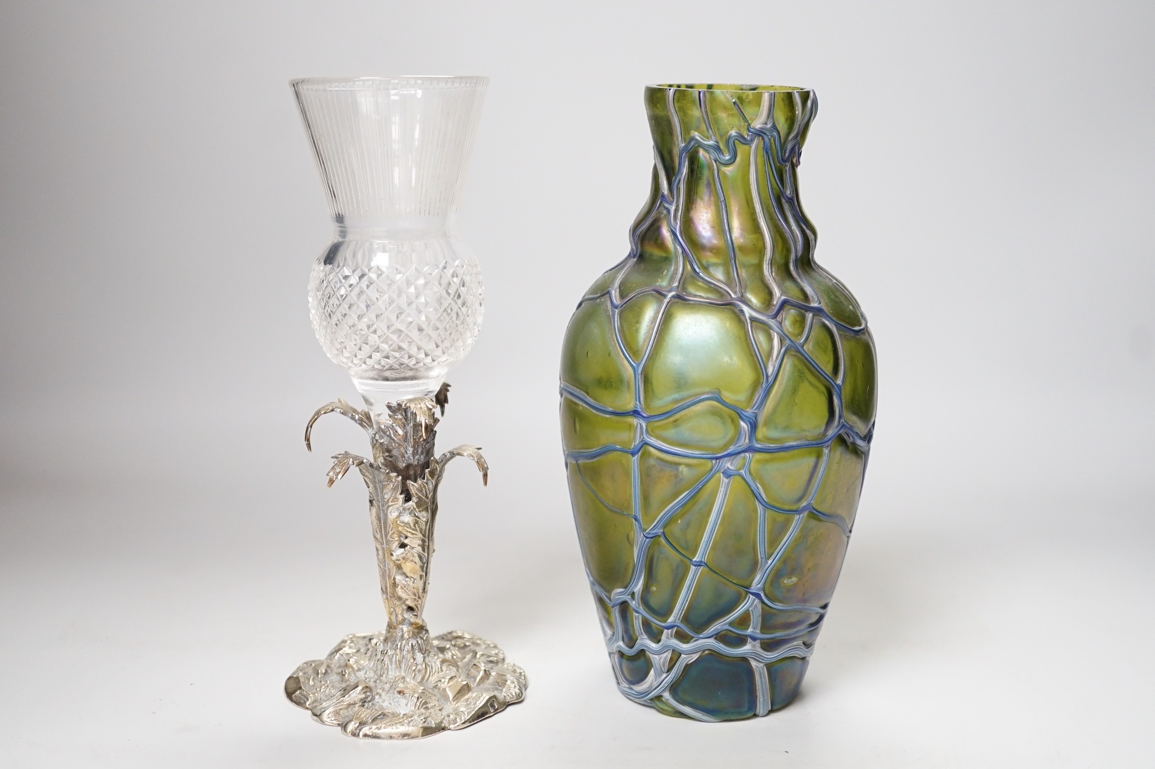 A Victorian thistle vase on cast plated base and a Pallme-Konig Art Nouveau glass vase